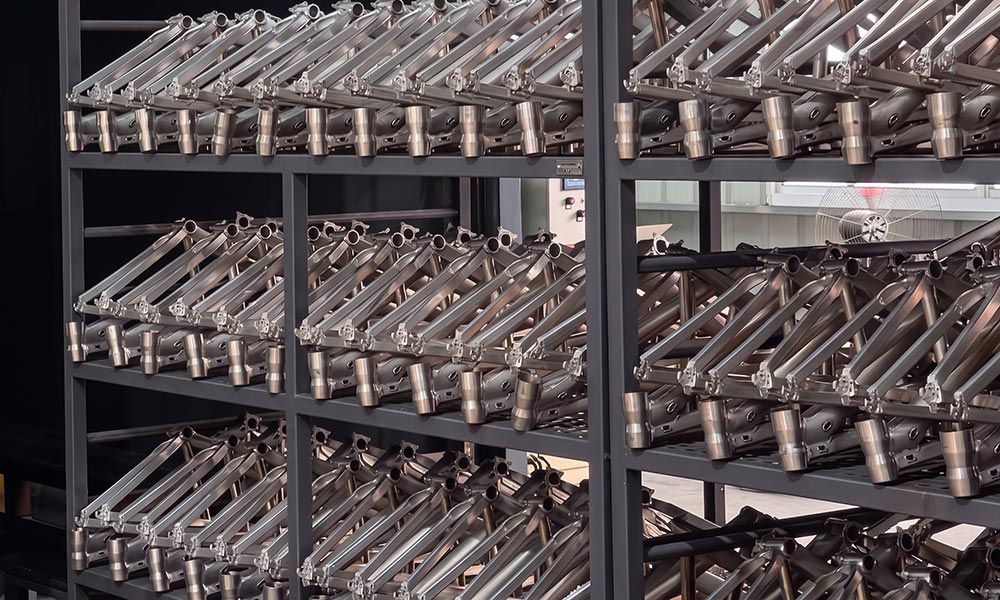 sanded cargo bike frames prepared for coating at United Mobility